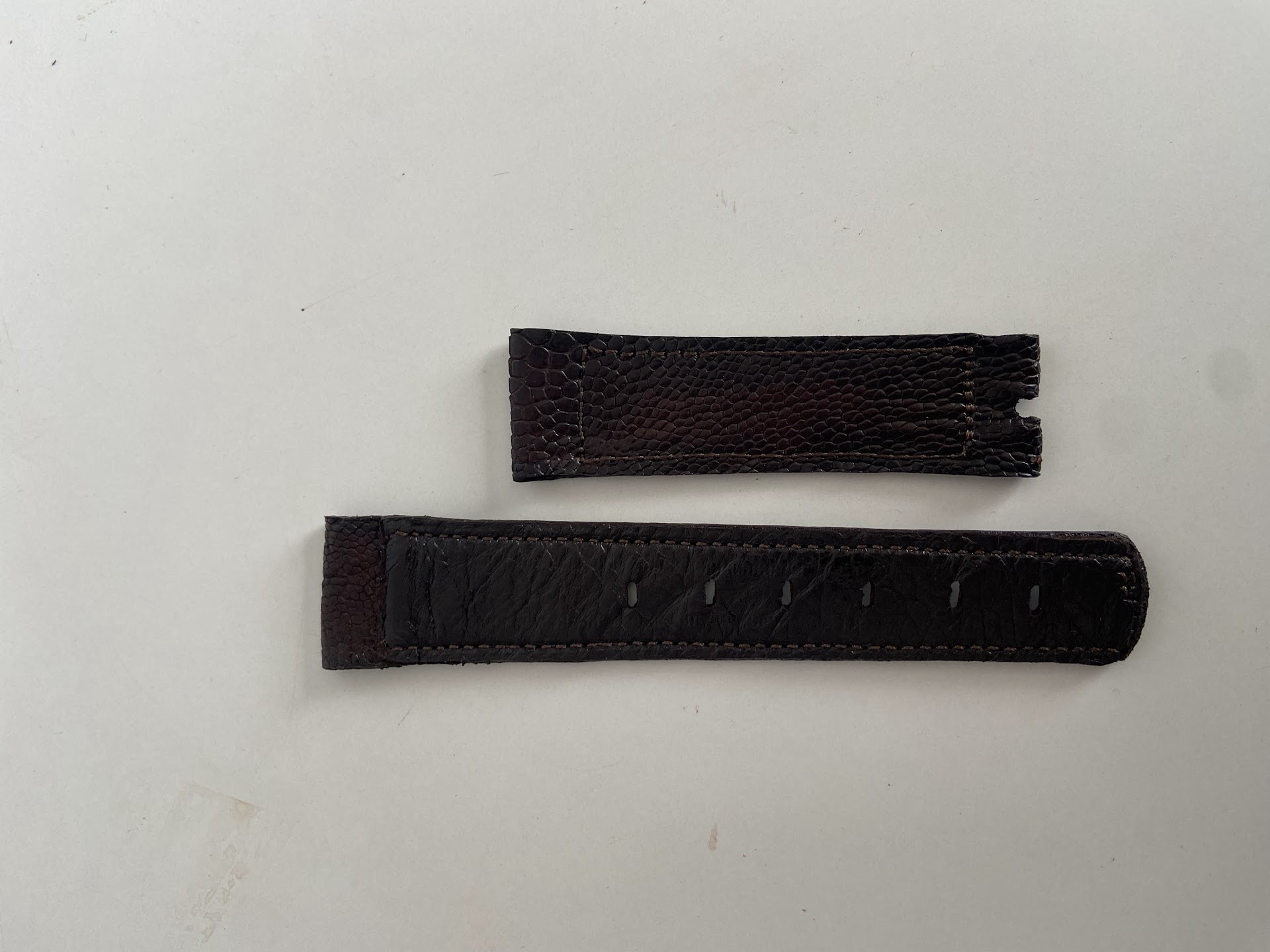 Two Dark Leather Strap Pieces — photo 1