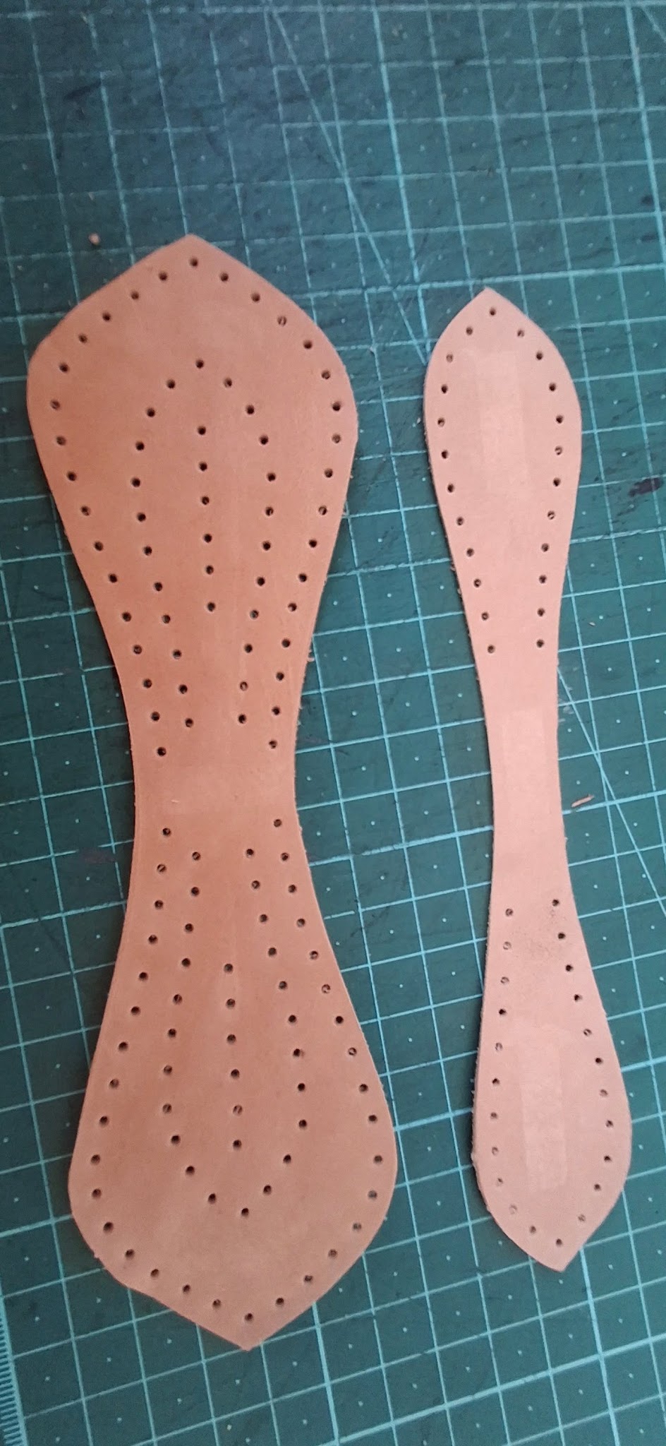 Punched leather pieces ready for stitching