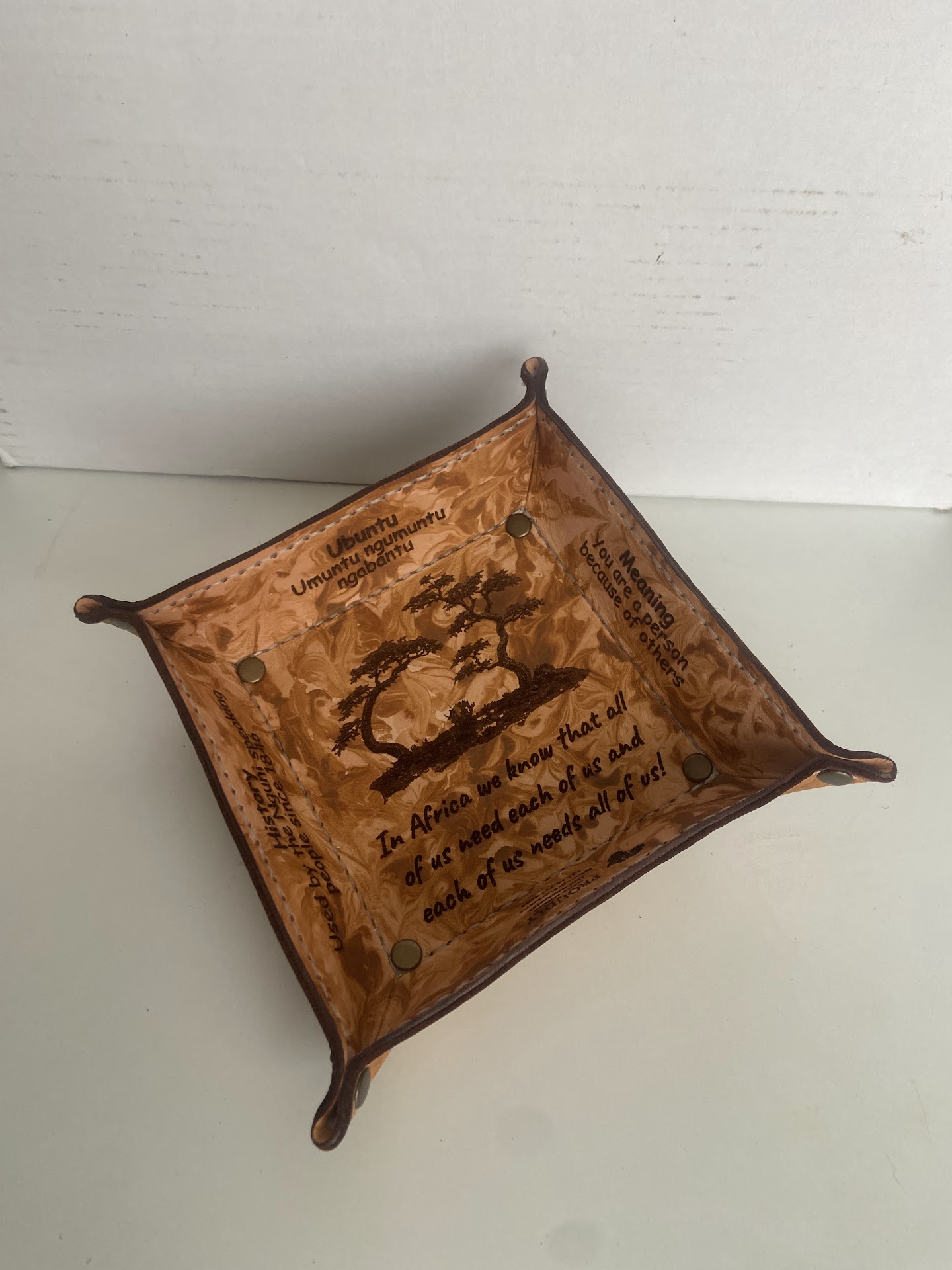 Hand-stitched patterned leather catchall tray