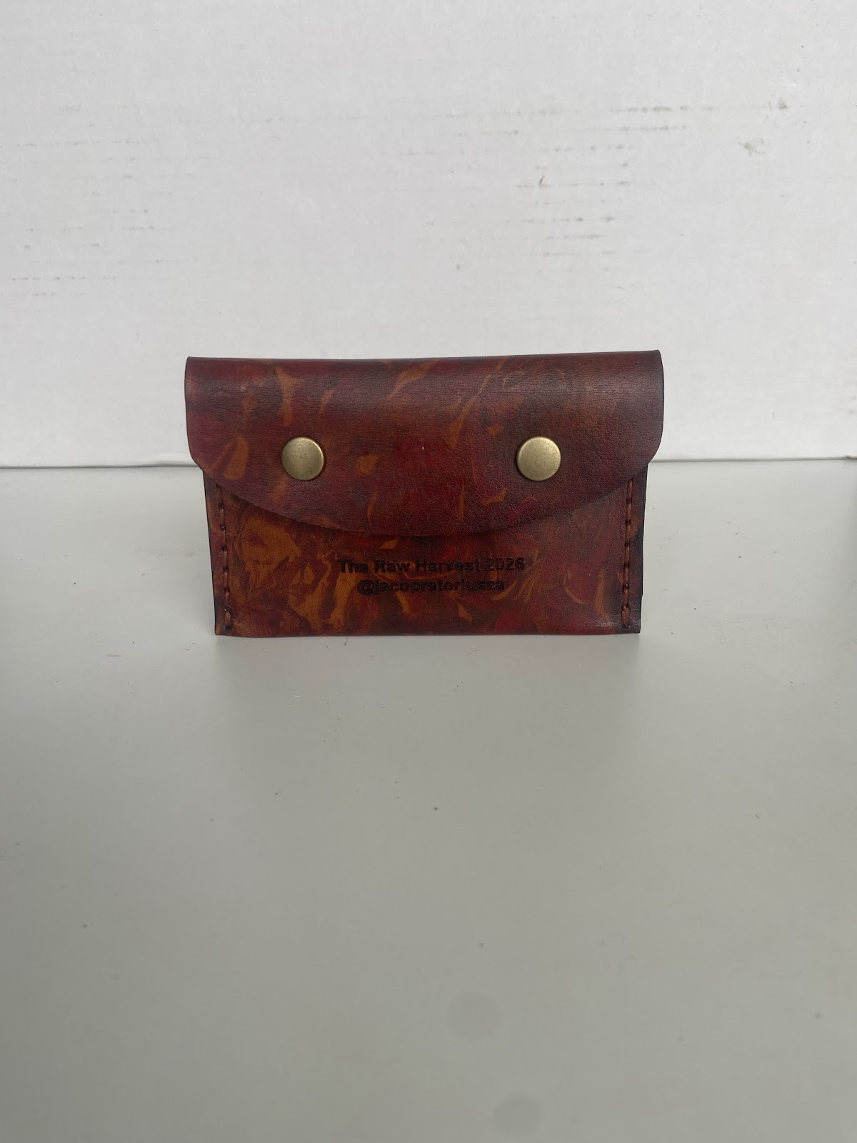 Rust-Brown Patterned Double-Snap Leather Pouch — photo 1